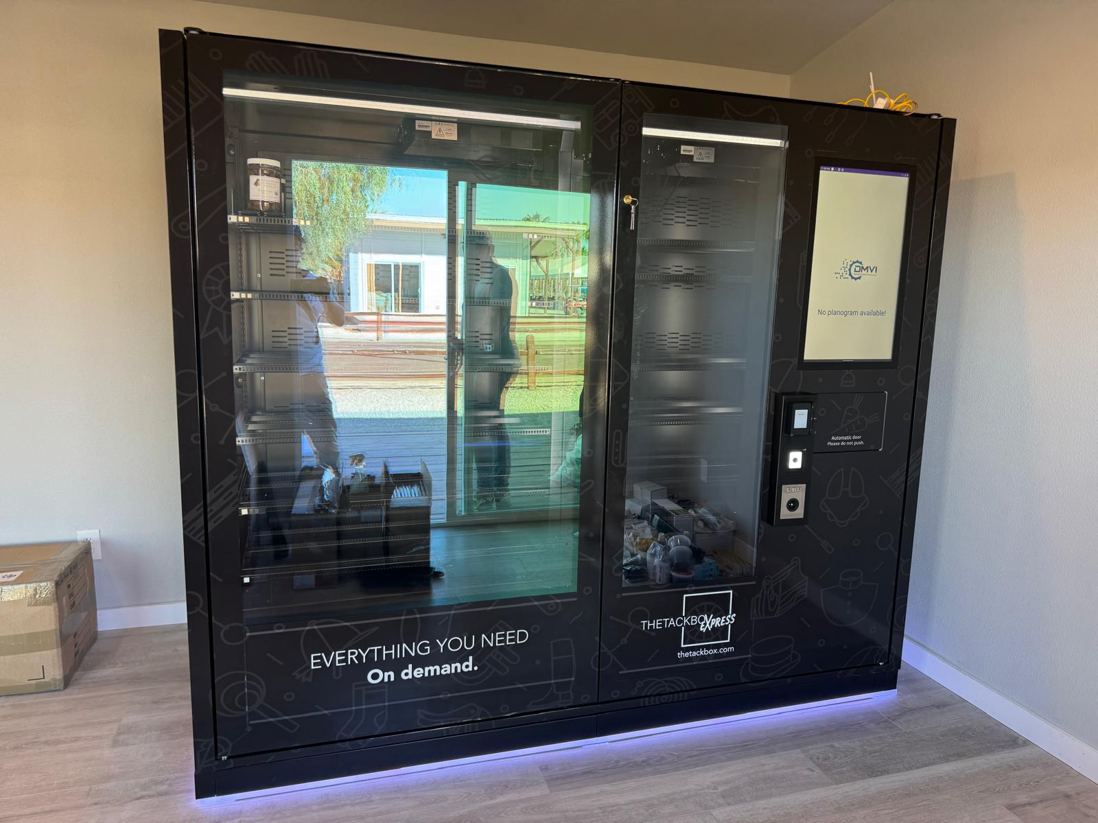 Installed M-Series vending machine with branding and interface visible